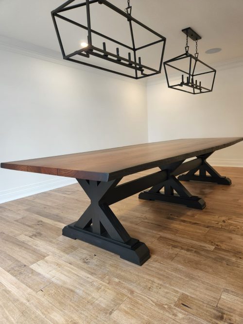 Image highlighting custom designed tressle base for Mahogany table
